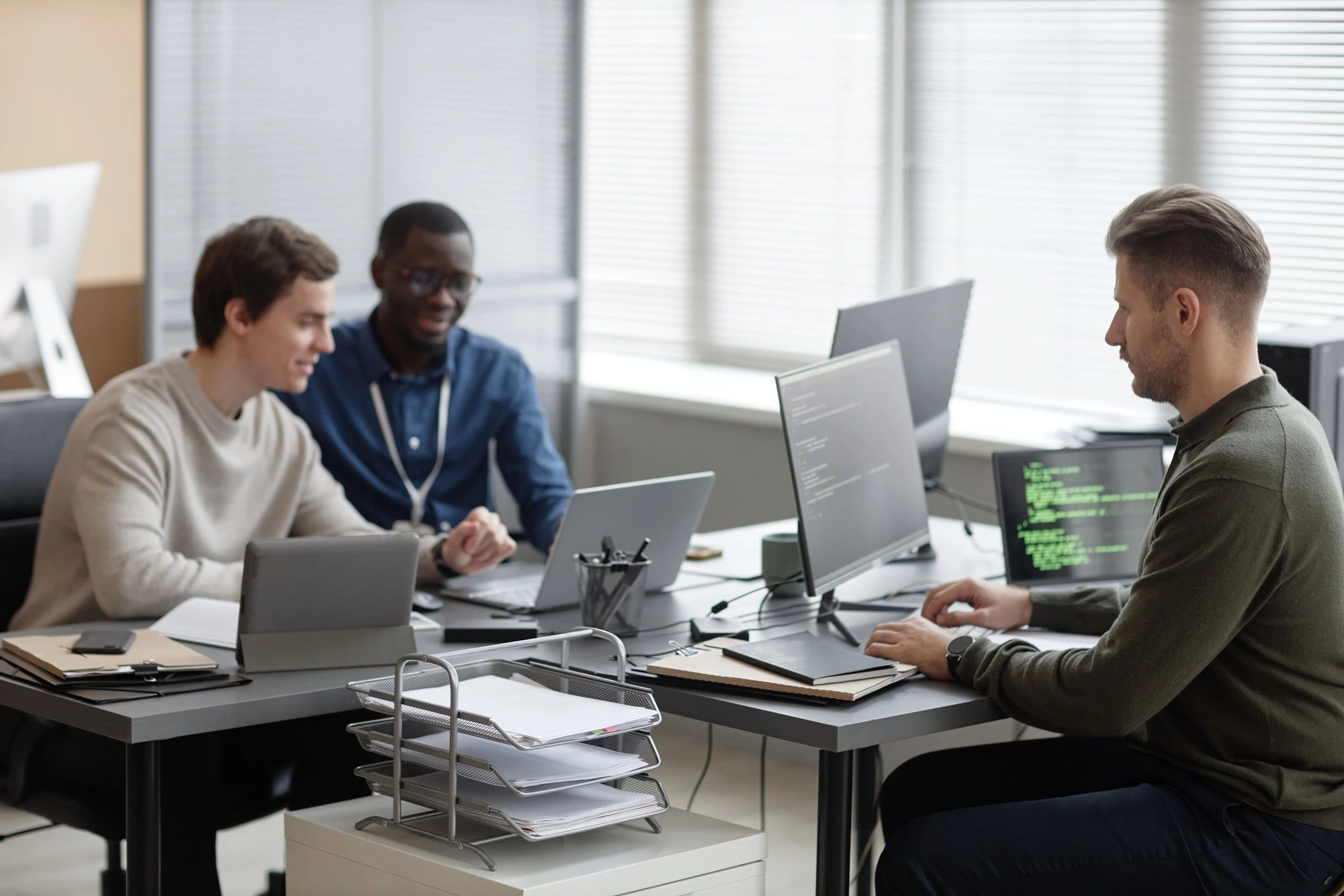 Team working in a secure technology office representing third-party platform operations